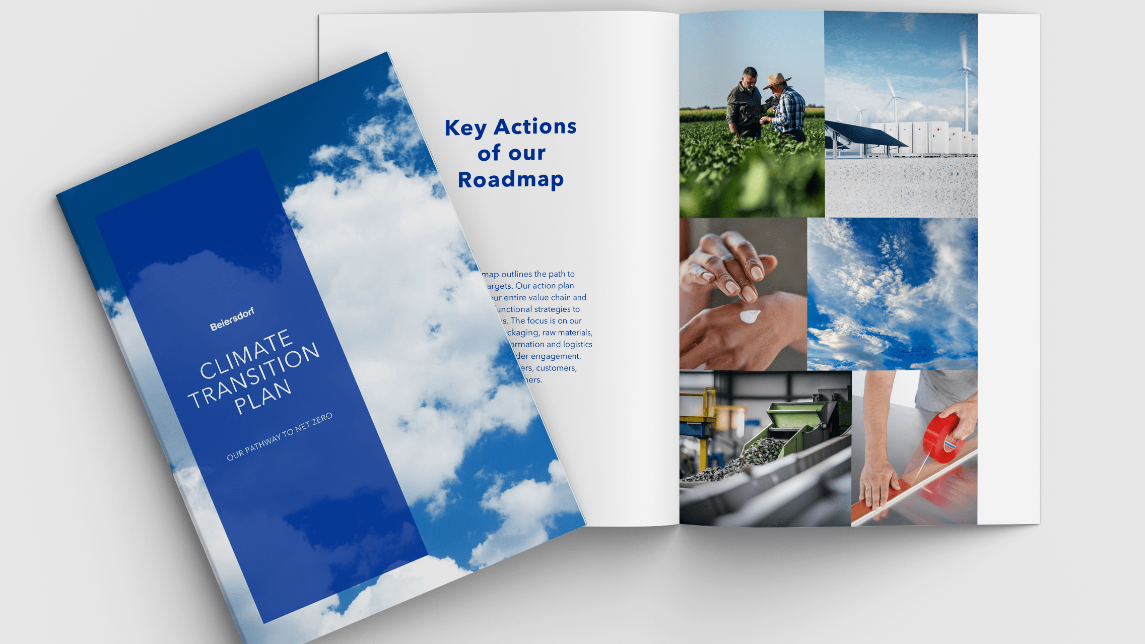 Aufgeschlagenes Buch mit dem Titel Climate Transition Plan auf grauem Hintergrund.